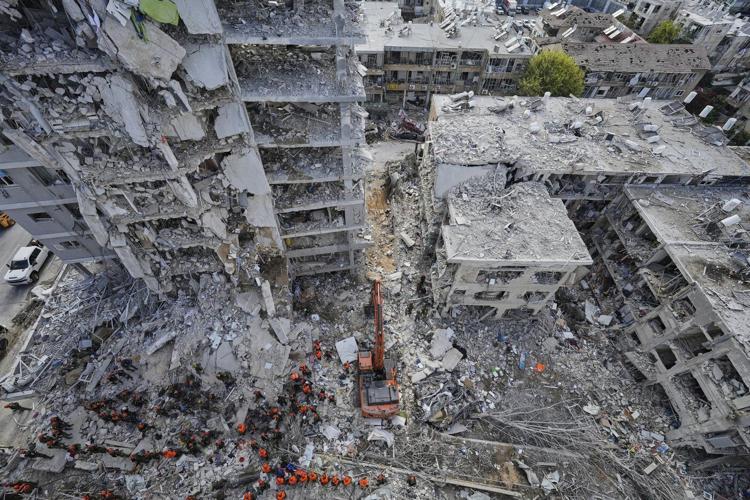 Photos of a tense week as Iranian missiles bypass air defenses in retaliatory strikes on Israel