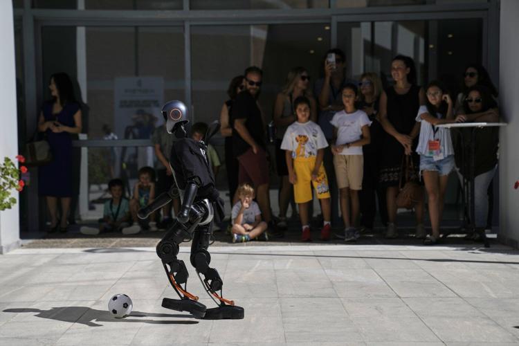 Humanoid robots showcase skills at Ancient Olympia. But they're on a long road to catch up to AI