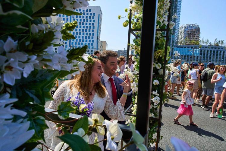 Couples tie the knot during a festival on an Amsterdam ring road
