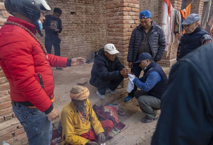 Tens of thousands gather for Hindu festival at Nepal temple, with many lighting up marijuana joints