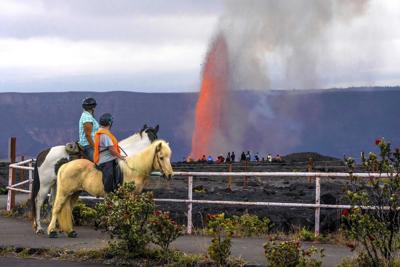 Hawaii's Kilauea volcano puts on a fiery show with a towering fountain of lava