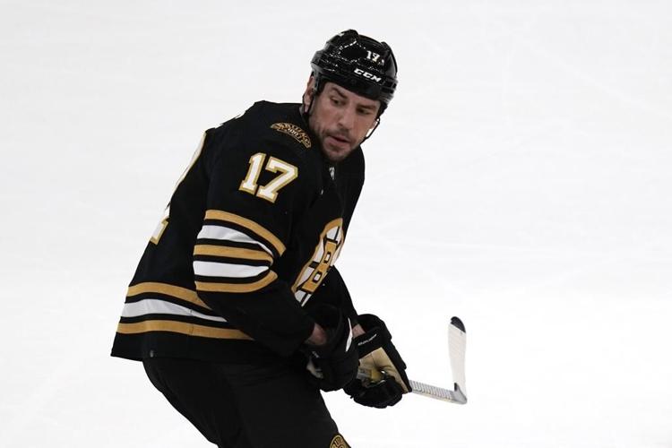 Boston Bruins forward Lucic to be arraigned on assault charge after wife called police to their home