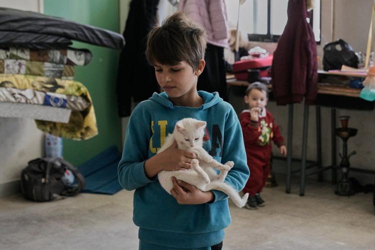 Photos of displaced civilians in Lebanon, where schools and stadiums turn into shelters during war