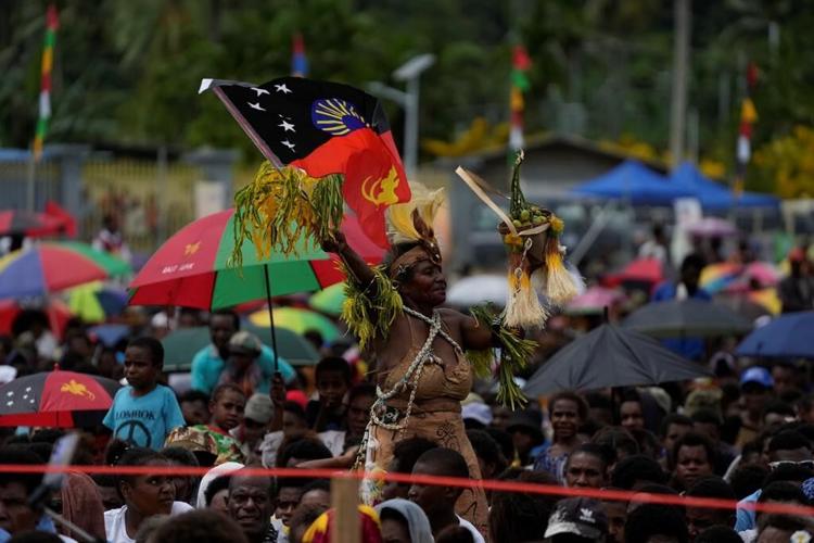 Pope arrives in the remote jungles of Papua New Guinea with a ton of humanitarian aid and toys