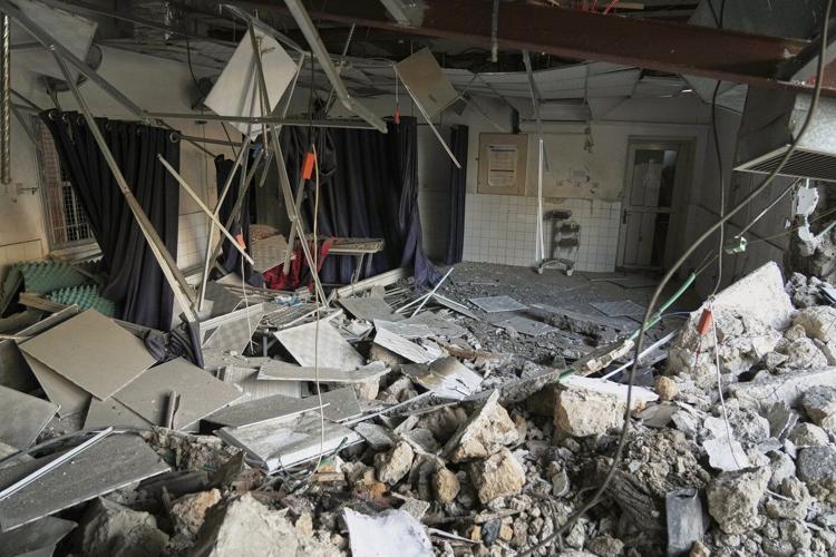 Israel strikes a hospital in Gaza, forcing evacuation as strikes intensify