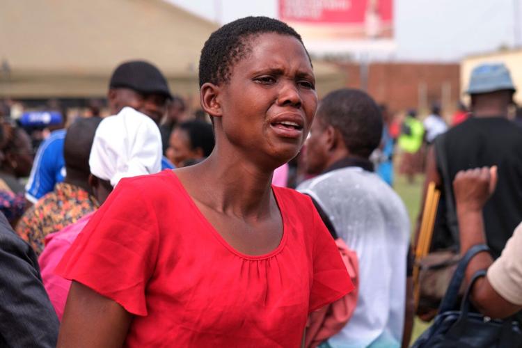 12 more bodies are recovered in Zimbabwe's ferry disaster, bringing death toll to 84