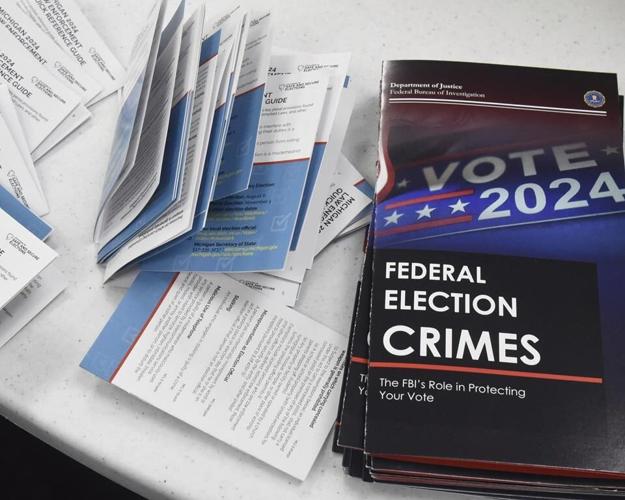 Local election workers fear threats to their safety as November nears. One group is trying to help