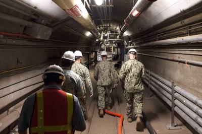 US military drains fuel from tank facility that leaked fuel into Pearl Harbor's drinking water