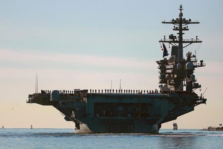 US top Middle East commander visits deployed aircraft carrier, and other Mideast news
