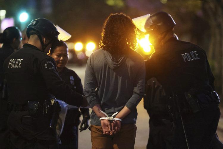 AP PHOTOS: Protests surge across US after Trump mobilizes troops