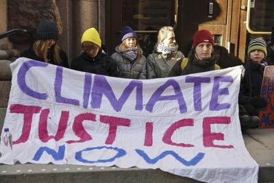 Greta Thunberg and other climate activists block entrance to the Swedish parliament