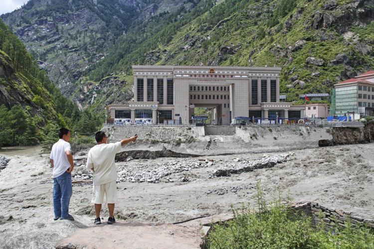 Rescuers search for 19 missing and recover 9 bodies after flooding in Nepal