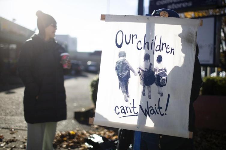 Teachers in Portland, Oregon, march and temporarily block bridge in third week of strike