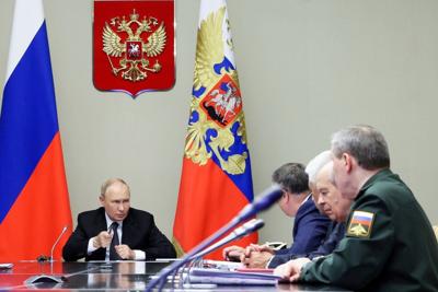 Latvia's security service says 2 people set fire to a train and rail equipment for Russia