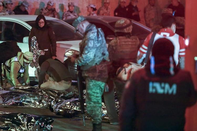 Migrants start fire at Mexico detention center, killing 40