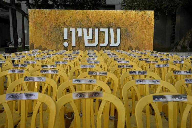 An Israeli airstrike kills 18 members of a family in Gaza as mediators hope for a cease-fire