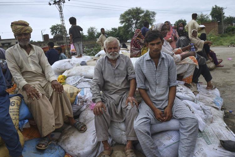 Pakistani rescuers use drones to help evacuate thousands as floods devastate Punjab