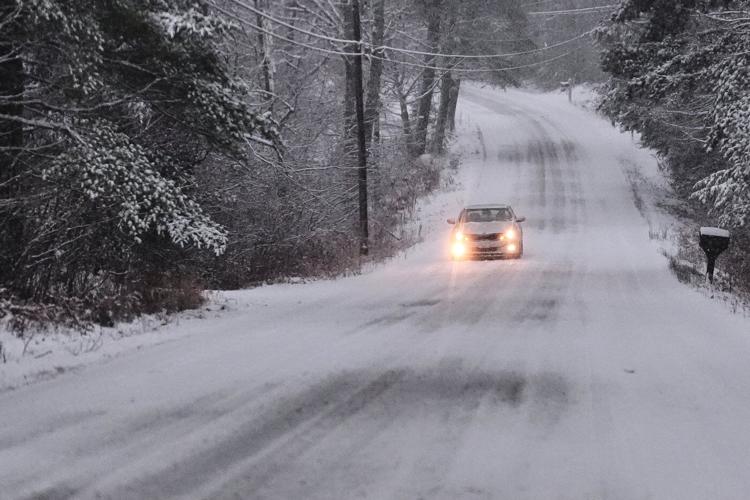 Winter's first big snowstorm hits the Northeast as schools close and traffic slows