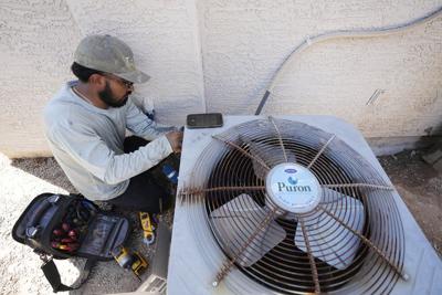 Should the air conditioning be turned off when you're out, or left on? It depends, experts say
