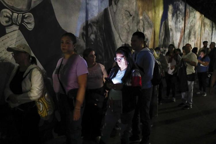 The Latest: Venezuela chooses between another presidential term for Maduro or a big change