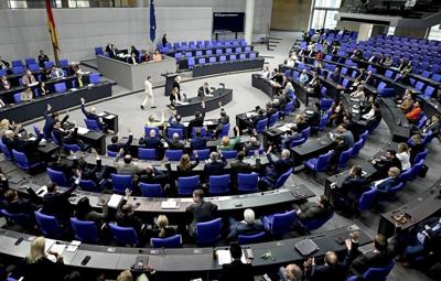 German parliament approves payment cards for asylum-seekers to limit cash payments