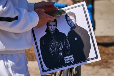 News photographers to resume covering Oasis concerts as band lifts restrictions