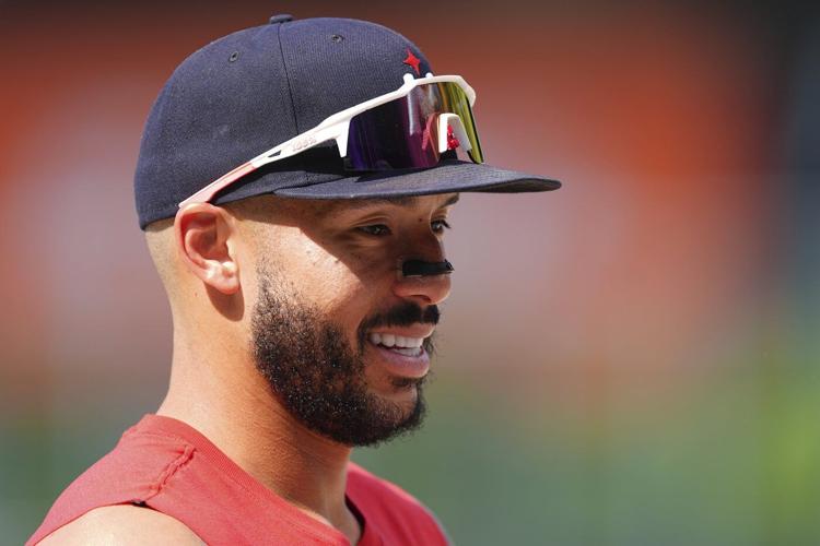 Carlos Correa is reuniting with the Astros after a trade from the Twins, AP source says
