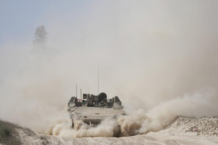 Hamas says it killed 12 Israeli-backed fighters. Israeli-supported group says they were aid workers