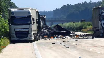 A multi-truck crash involving hazardous materials kills 2 on German highway