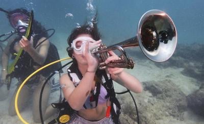 Underwater music show in the Florida Keys promotes awareness of coral reef protection