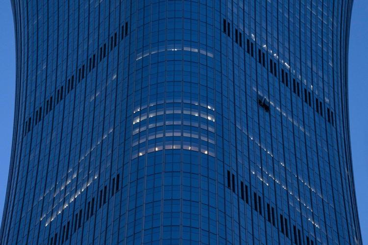 Small plane crash at Beijing high-rise kills the pilot and injures 13, authorities say