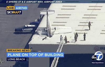Pilot escapes with minor injuries when small plane crashes into hangar's roof at California airport