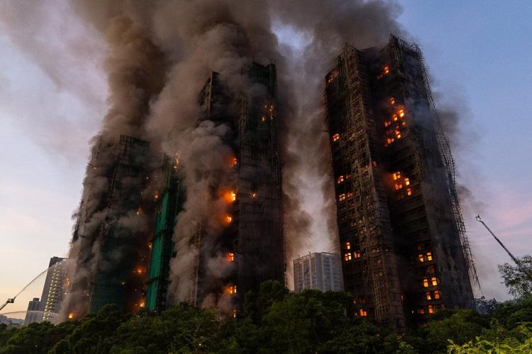 Hong Kong fire victims to return to burned homes, grieving losses and grappling with trauma