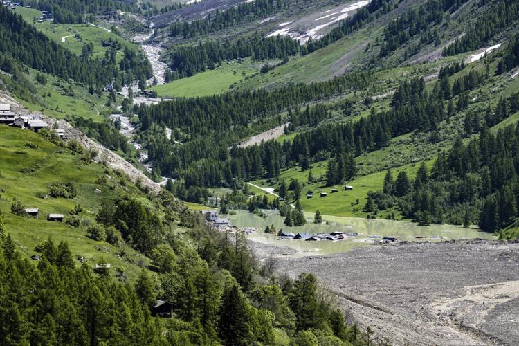Swiss president pledges aid for Alpine villagers left homeless after glacier collapse