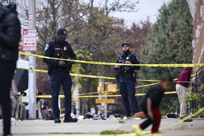 Baltimore police fired 36 shots at armed man, bodycam recordings show