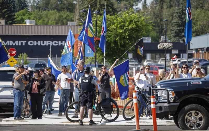 Duelling symbols: Alberta and Canada flags creating division ahead of referendum