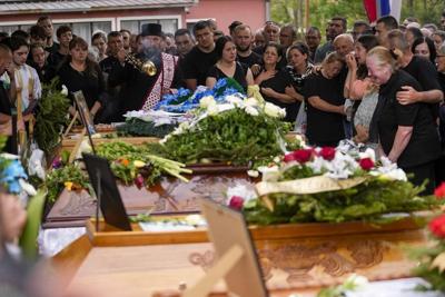 Serbia's education minister resigns following mass shootings