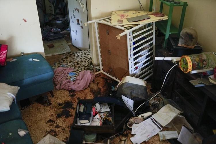 Ruins and memories of a paradise lost in an Israeli village where attackers killed, kidnapped dozens