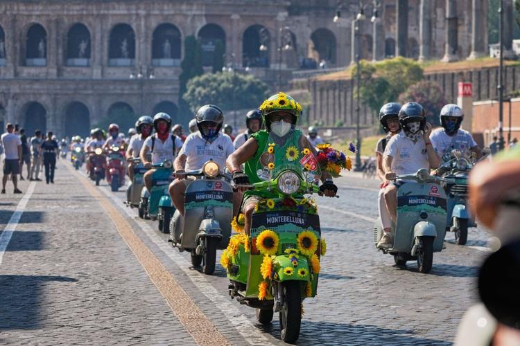Thousands of Vespas swarm Rome’s historic center to mark iconic scooter’s 80th anniversary