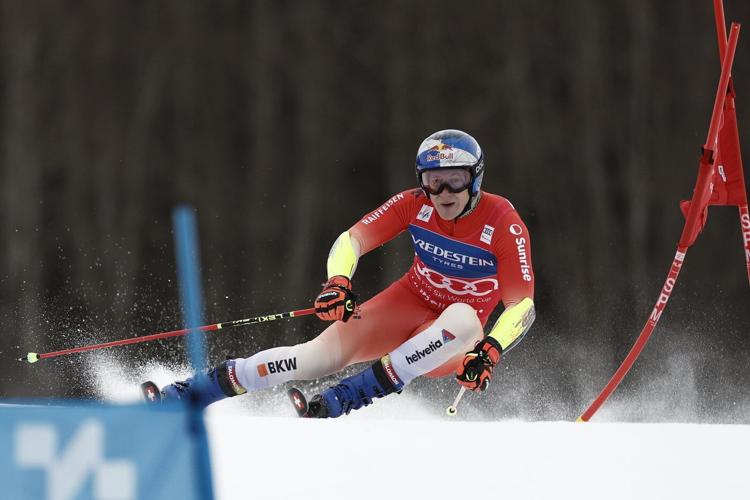 Swiss ski star Odermatt secures overall and GS World Cup titles in race won by teammate Meillard