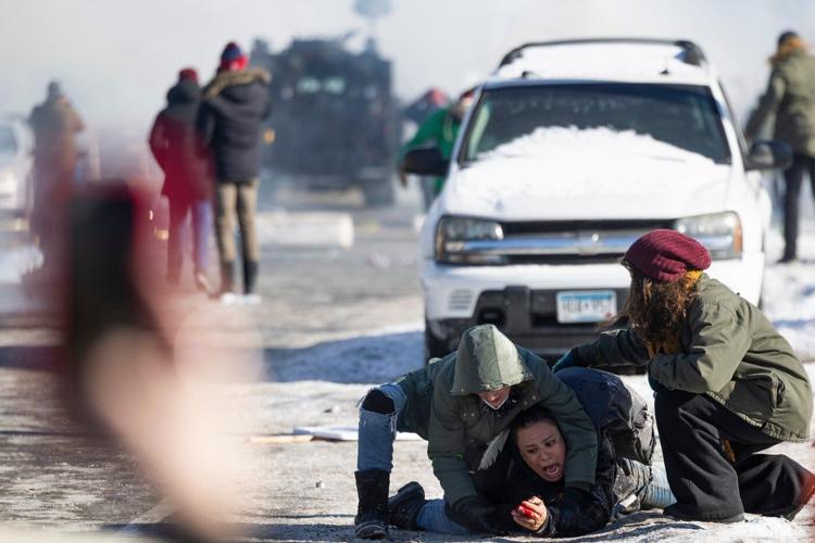 From frigid quiet to outraged sorrow, a few hours on Minneapolis street where agents killed man