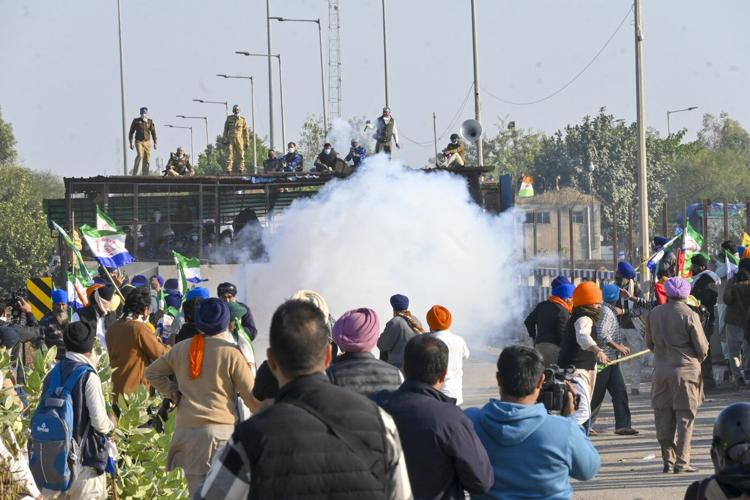 Police in India clash with farmers during protest march over minimum price demand for crops