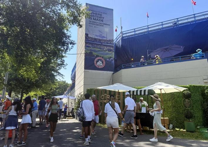Climate protesters briefly interrupted a tennis match between Andy Murray and Taylor Fritz in DC