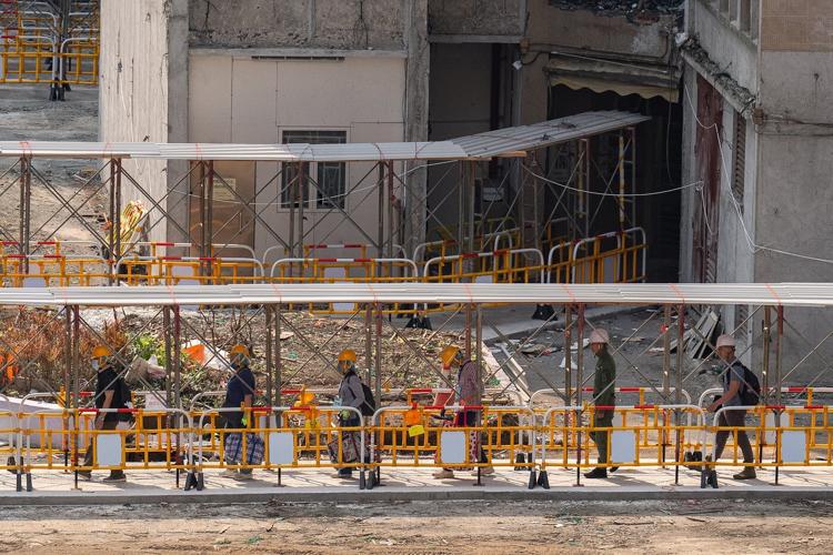 Grieving, traumatized survivors return to their homes 5 months after deadly Hong Kong fire