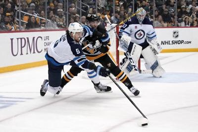 Scheifele scores twice as Jets soar past Pens 4-1