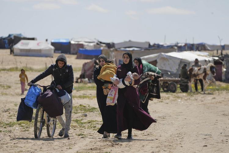 A pregnant woman under Israel's blockade in Gaza's ruins fears for her baby