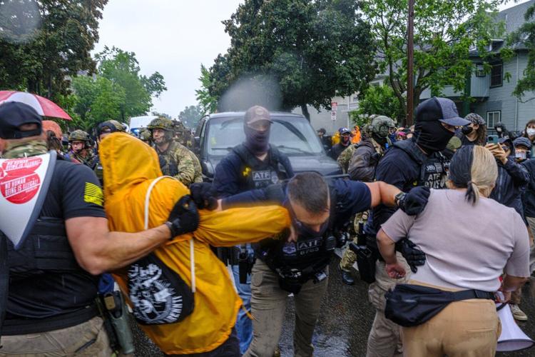 Federal officers in tactical gear went into a Latino community in Minneapolis. A protest followed