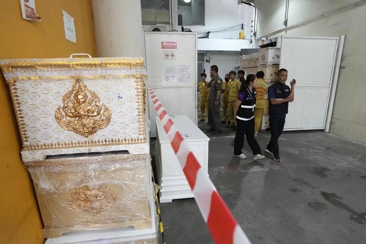 Thai police arrest driver and work to identify victims of school bus fire that killed 23