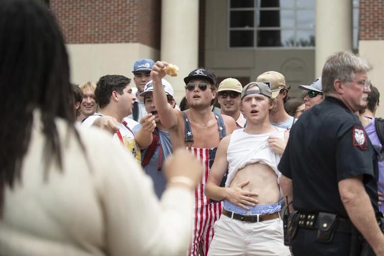 Congressman partly backtracks his praise of a campus conflict that included racist gestures