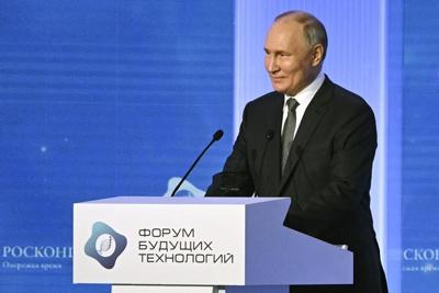 Putin says Russia prefers Biden to Trump but criticizes current US policy